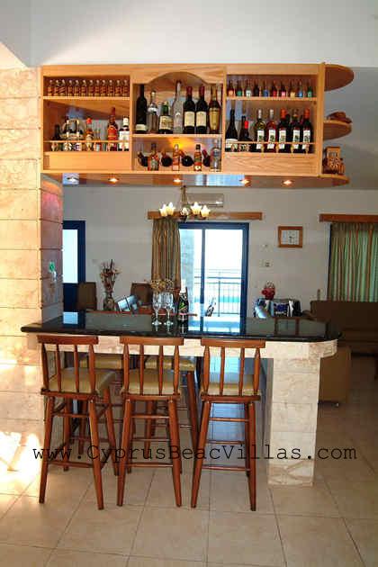bar with 5 high chairs